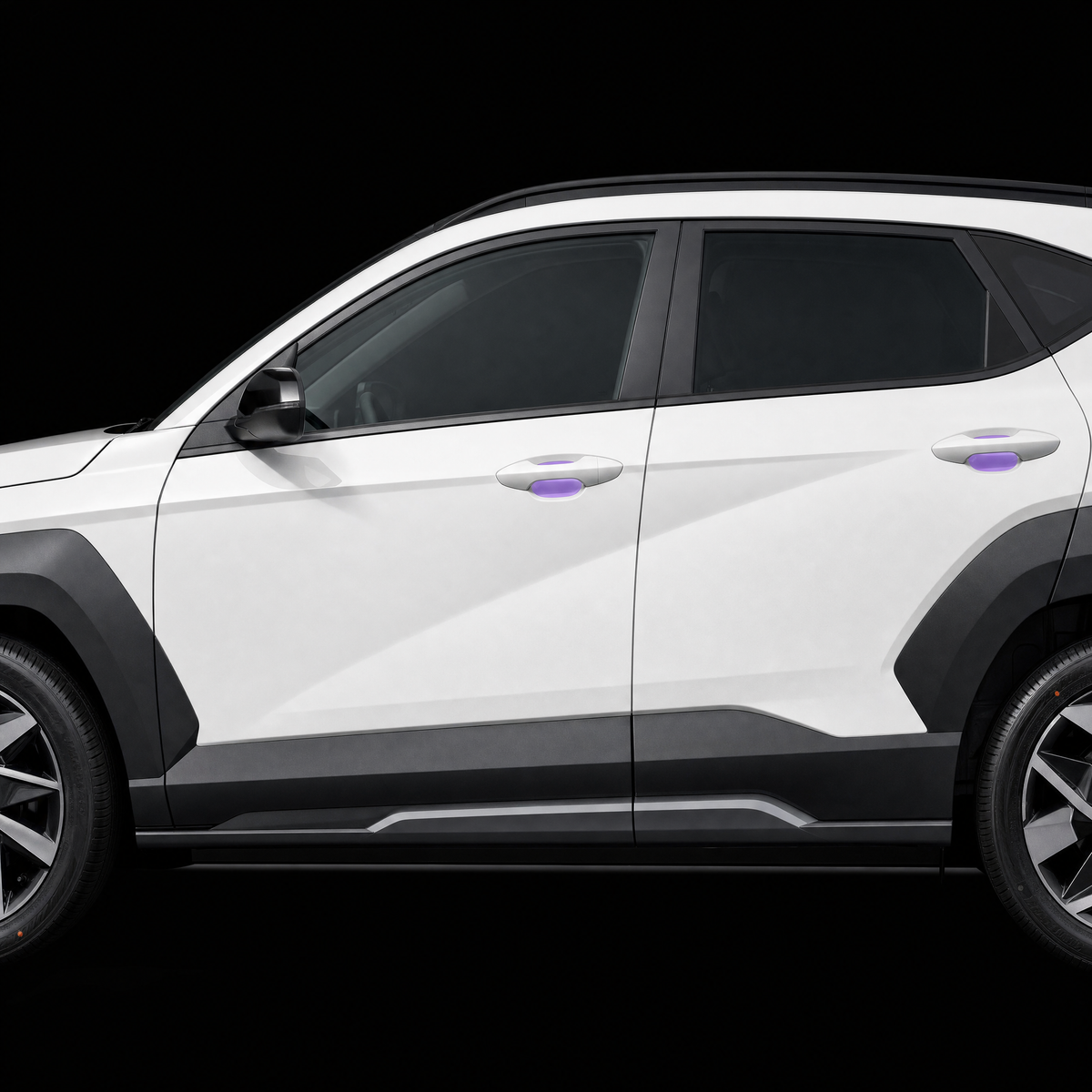 Hyundai Kona door handle cups on both doors with pre-cut PPF shown in translucent purple
