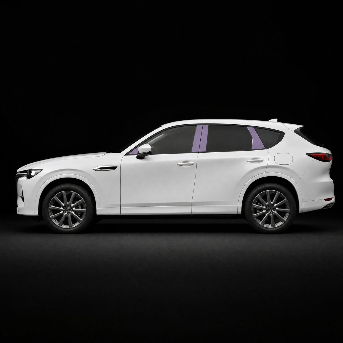 Pre-cut B and C pillar protection film shown tinted lilac on the pillar trims of a white Mazda CX-60