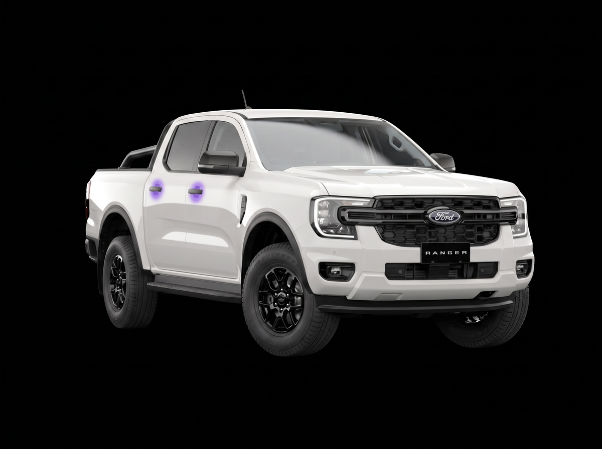 Pre-cut door handle cup protection film shown tinted purple on the door handles of a white Ford Ranger