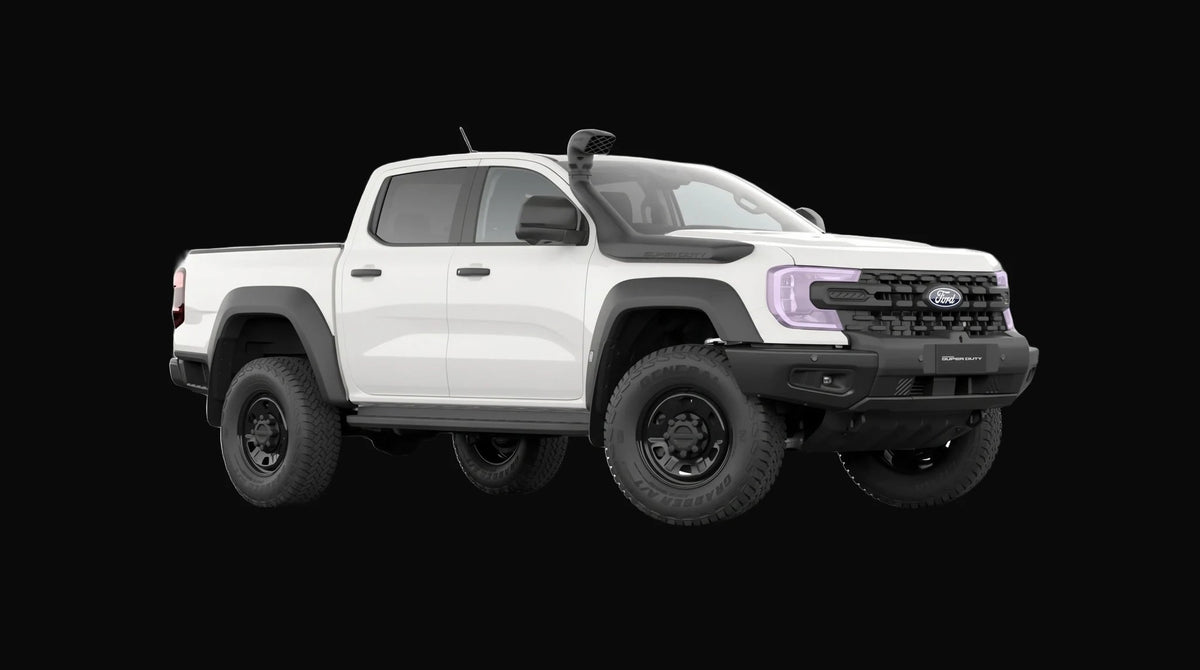 Pre-cut headlight protection film shown tinted lilac on the headlights of a white Ford Ranger Super Duty