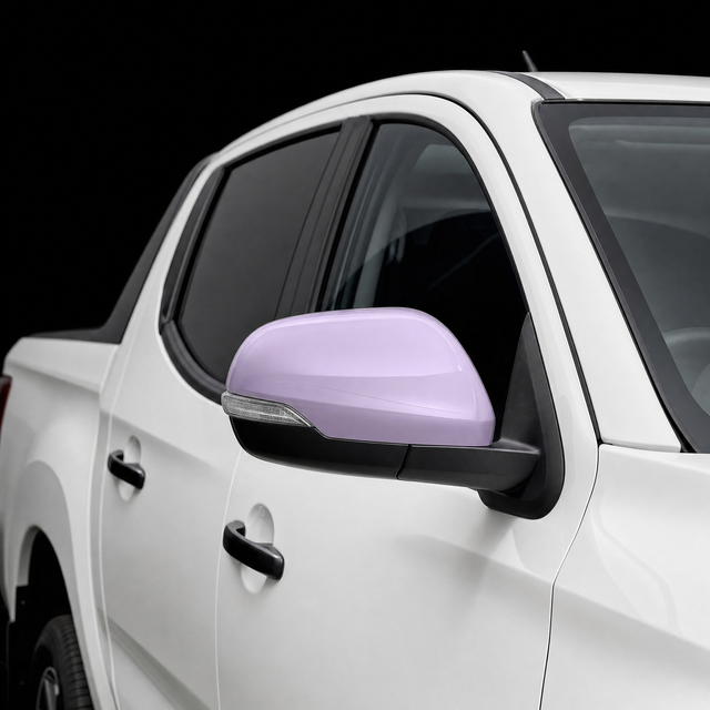 Pre-cut mirror cap protection film shown tinted lilac on the door mirror of a white Mitsubishi Triton 2021-2024