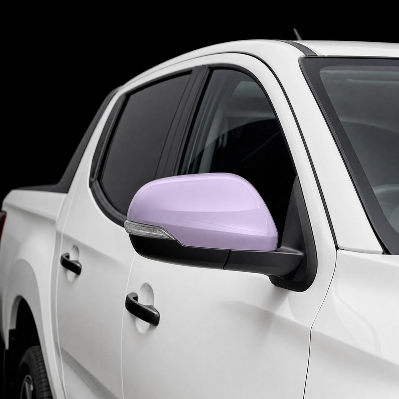 Pre-cut mirror cap protection film shown tinted lilac on the door mirror of a white Mitsubishi Triton 2021-2024