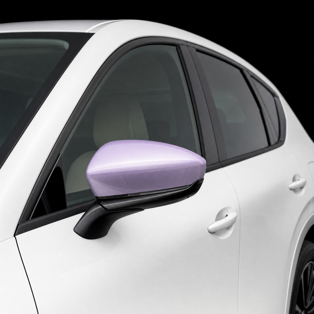 Pre-cut mirror cap protection film shown tinted lilac on the door mirror of a white Mazda CX-60