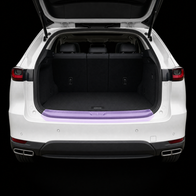 Pre-cut luggage sill protection film shown tinted lilac on the boot loading lip of a white Mazda CX-60