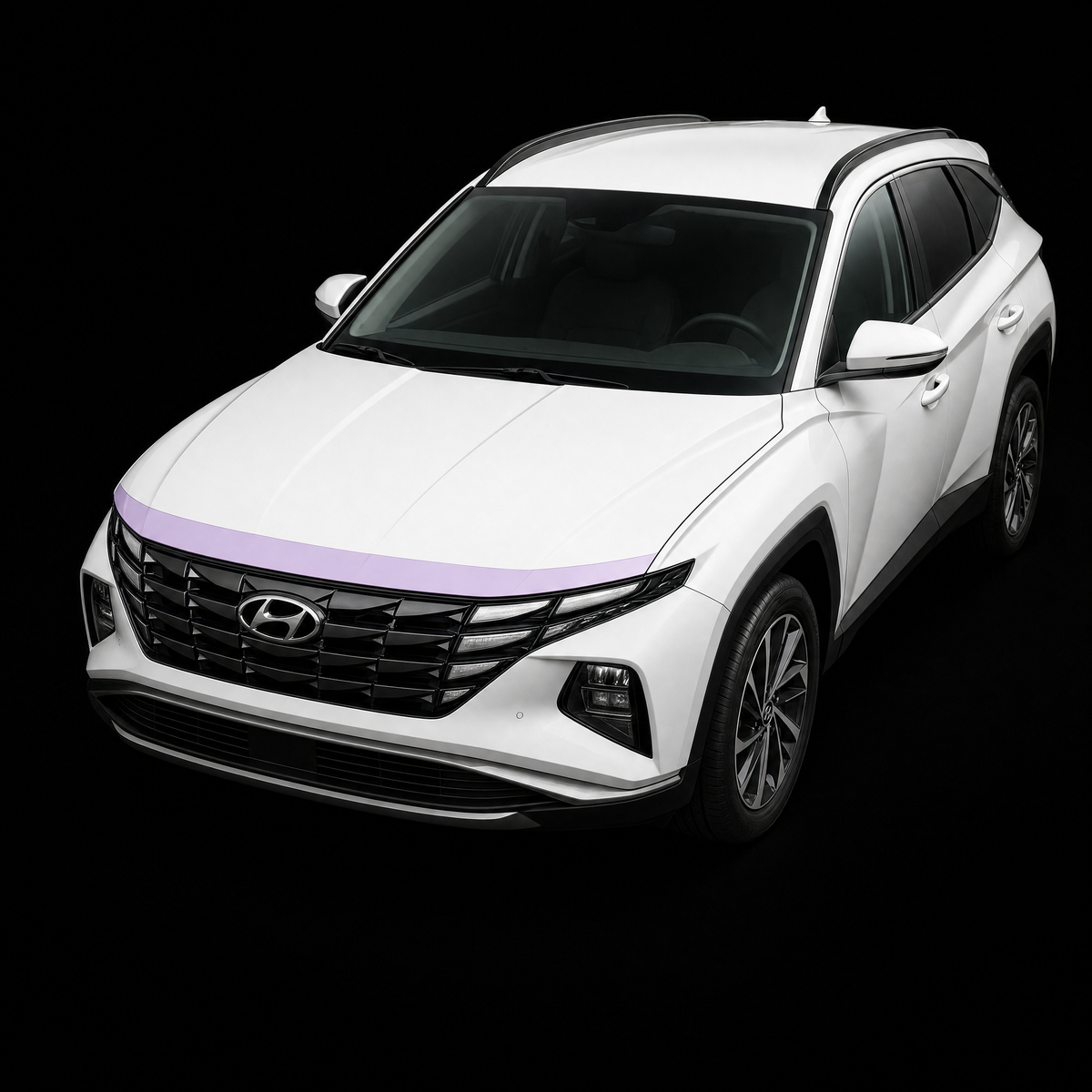 Pre-cut bonnet protection film strip shown tinted lilac on the leading edge of a white Hyundai Tucson