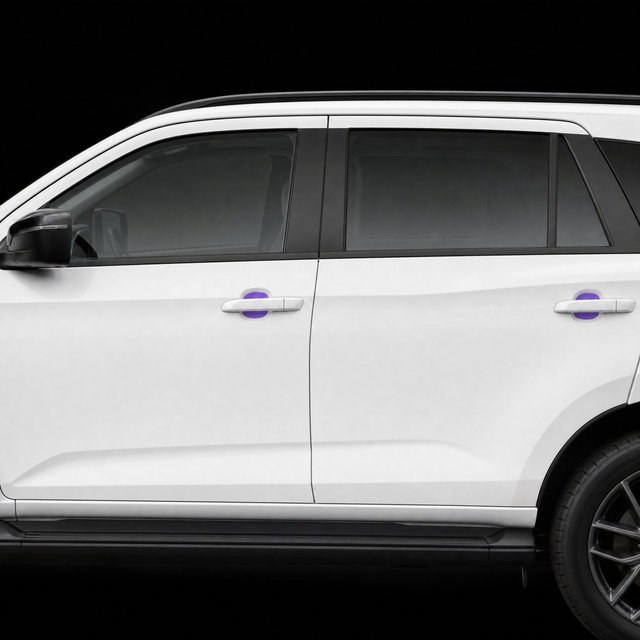 Pre-cut door handle cup protection film shown tinted purple in both door cups of a white Isuzu MU-X