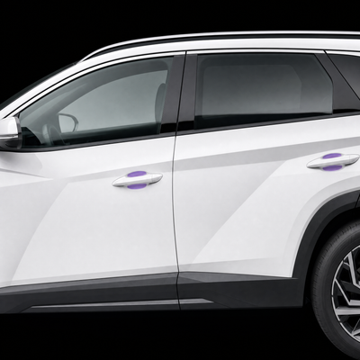 Pre-cut door handle cup protection film shown tinted purple in both door cups of a white Hyundai Tucson