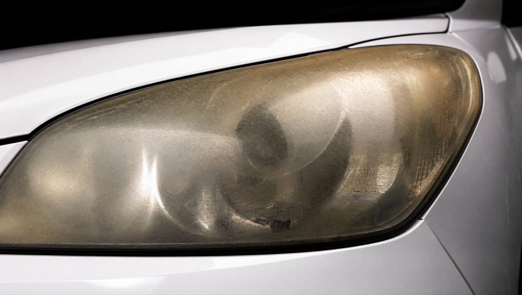Australian UV is hazing your headlights, and stones are cracking them.
